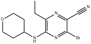 3-bromo-6-etil-5-((tetrahydro-2H-pyran-4-yl)amino)pirazin-2-karbonitril